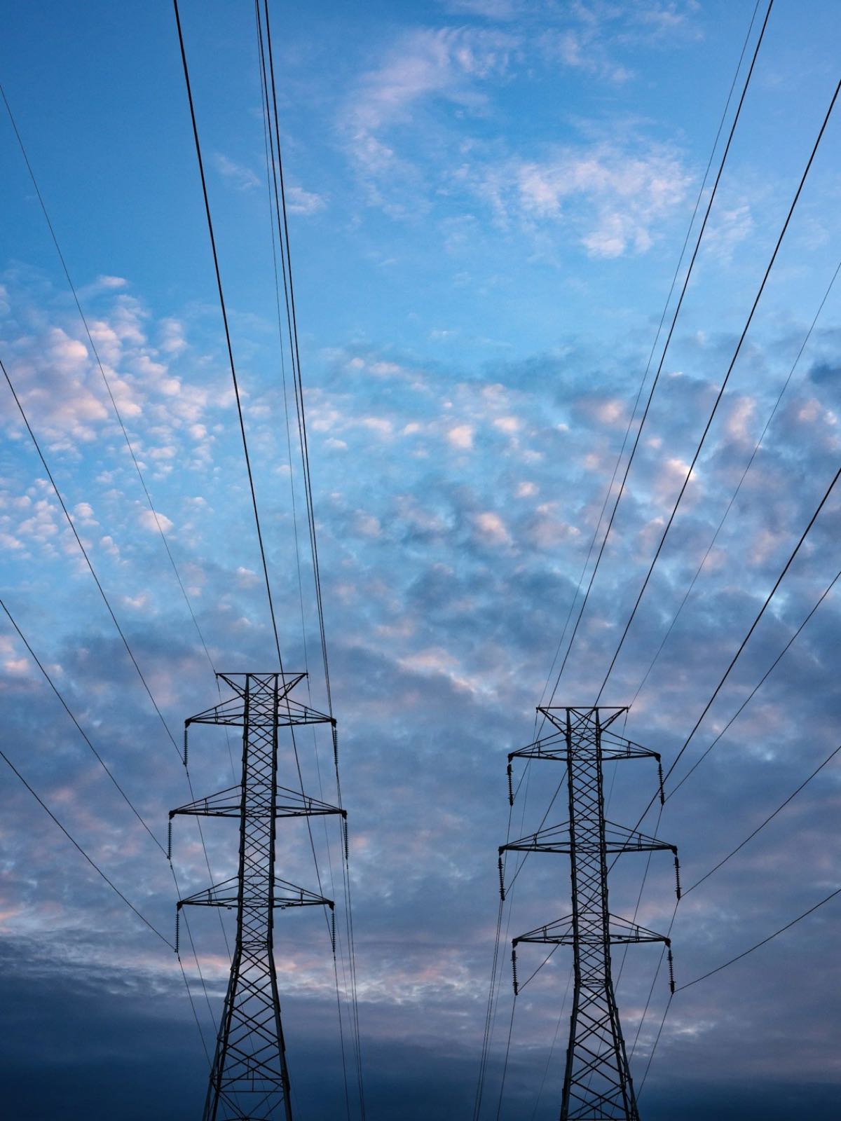 Power transmission lines at dusk